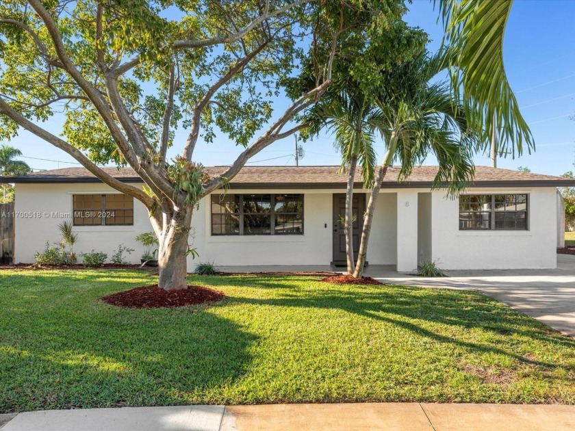 Welcome to this charming 3-bed, 2.5-bath home, w/ bonus room for - Beach Home for sale in Deerfield Beach, Florida on Beachhouse.com