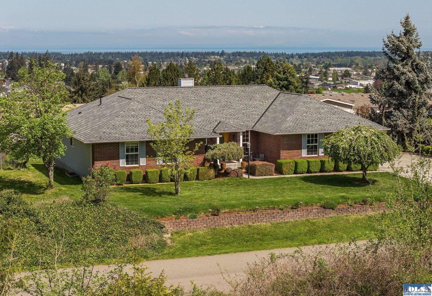 Spacious, water view home with a lot of livability in the city - Beach Home for sale in Sequim, Washington on Beachhouse.com