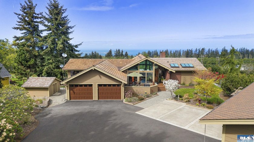 Tucked away in a setting of quiet privacy, yet just moments from - Beach Home for sale in Port Angeles, Washington on Beachhouse.com