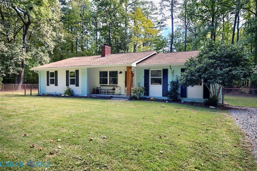 Discover serene waterfront living at its finest in this - Beach Home for sale in Mathews, Virginia on Beachhouse.com