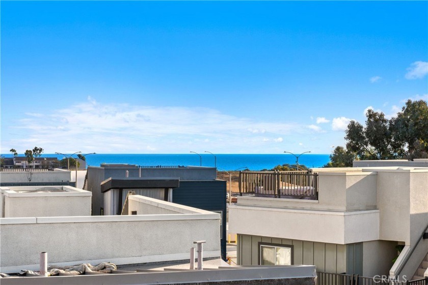 OCEAN VIEWS in Costa Mesa? Yes please! ROOFTOP DECK showcasing - Beach Home for sale in Costa Mesa, California on Beachhouse.com