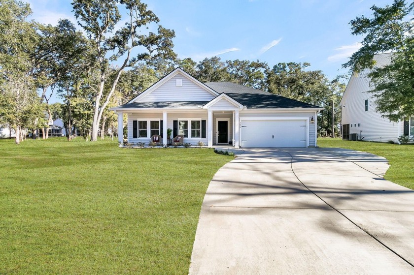 Stunning Pond Front Home - A True Private Oasis! Welcome to 7078 - Beach Home for sale in Johns Island, South Carolina on Beachhouse.com