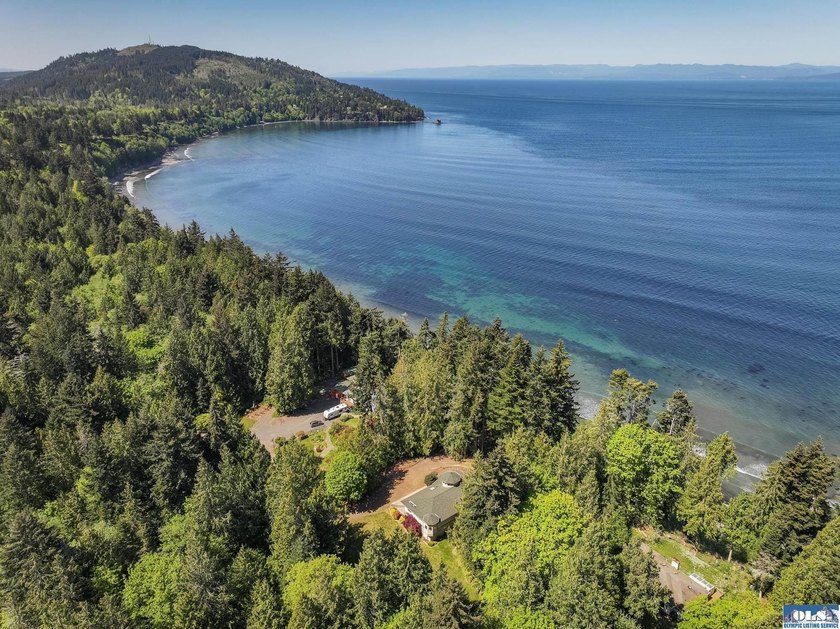 A waterfront retreat along Freshwater Bay with gated entry and - Beach Home for sale in Port Angeles, Washington on Beachhouse.com