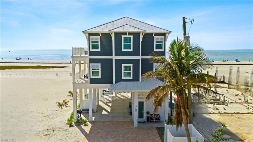 Step into the laid-back magic of Gulf-front living at 70 Avenue - Beach Home for sale in Fort Myers Beach, Florida on Beachhouse.com