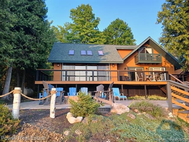 This luxurious cedar cottage comes with 120 feet of private - Beach Home for sale in Charlevoix, Michigan on Beachhouse.com