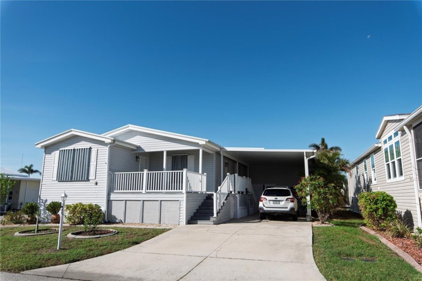 Located in the sought-after 55+ community of Windmill Village - Beach Home for sale in Punta Gorda, Florida on Beachhouse.com