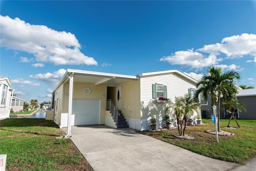 Nestled in the desirable 55+ community of Windmill Village, this - Beach Home for sale in Punta Gorda, Florida on Beachhouse.com