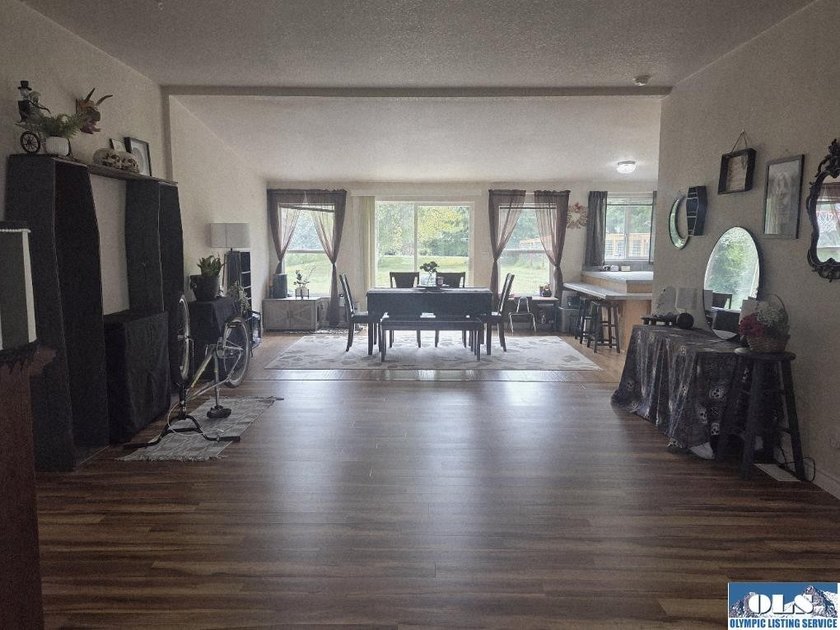 Space and natural light abound in this beautifully maintained - Beach Home for sale in Sequim, Washington on Beachhouse.com