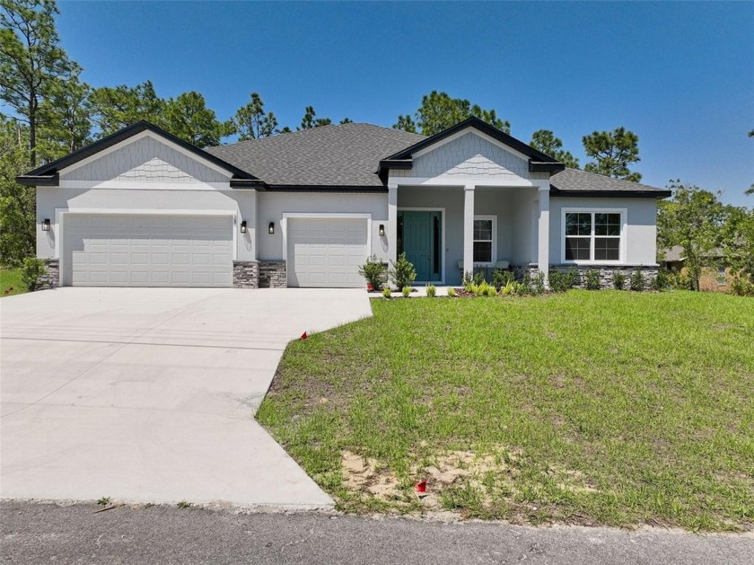This beautiful 4 Bedroom/3 Bath with 3 CAR GARAGE NEW - Beach Home for sale in Homosassa, Florida on Beachhouse.com