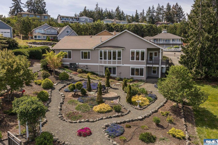 Well-maintained and move-in ready, this 2,908 SF home offers 3 - Beach Home for sale in Sequim, Washington on Beachhouse.com