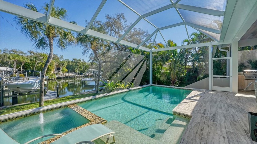 Indulge in the epitome of waterfront luxury living with this - Beach Home for sale in Sarasota, Florida on Beachhouse.com