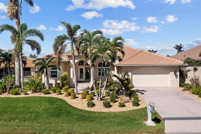 Burnt Store Isles! This beautifully updated 3-bedroom, 3-bath - Beach Home for sale in Punta Gorda, Florida on Beachhouse.com