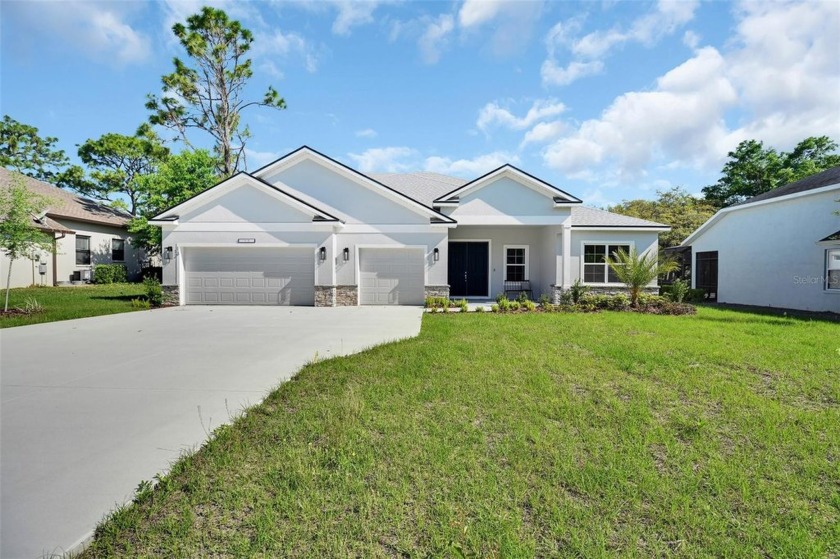 Welcome to this gorgeous and expansive NEW CONSTRUCTON home on - Beach Home for sale in Homosassa, Florida on Beachhouse.com