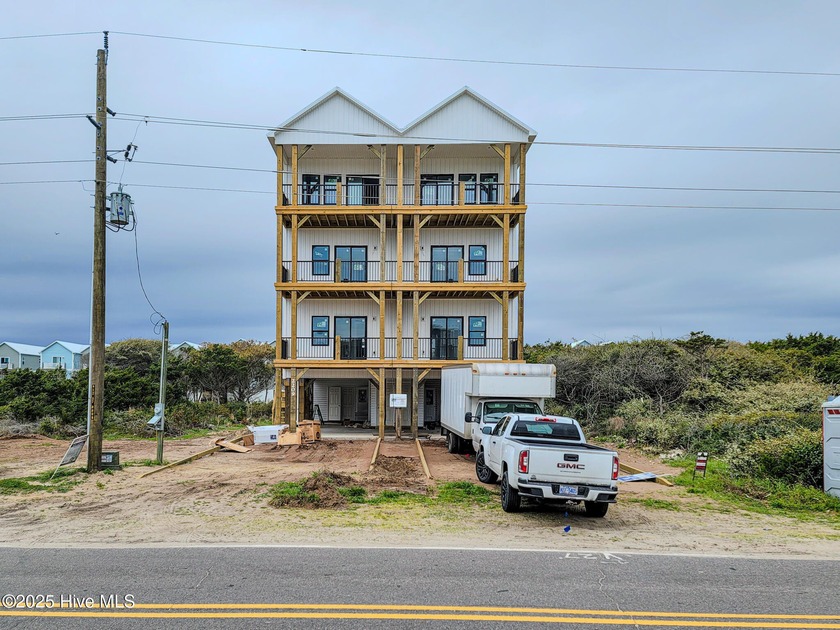 COME VIEW THIS NEW CONSTRUCTION, WITH 4 BEDROOMS, 4.5 BATHS WITH - Beach Home for sale in Surf City, North Carolina on Beachhouse.com