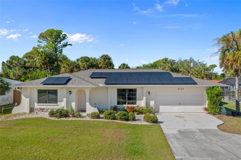 DOUBLE LOT! MOVE-IN-READY! Charming 2 bedroom, 2 bath, 2-car - Beach Home for sale in Port Charlotte, Florida on Beachhouse.com