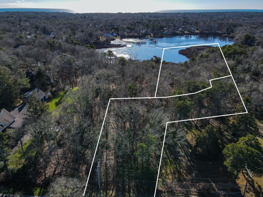 Build your dream home on this beautifully wooded pond-front - Beach Acreage for sale in Harwich, Massachusetts on Beachhouse.com