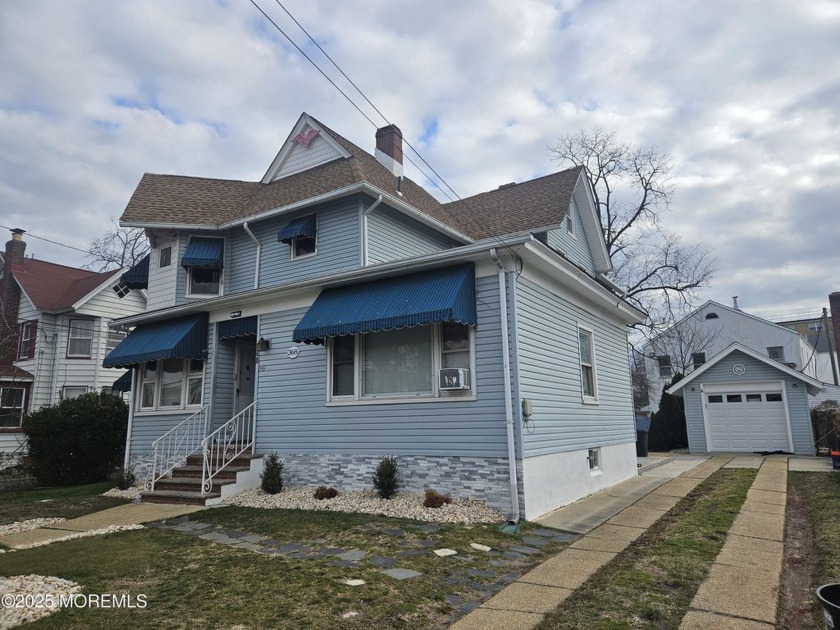 Come explore this well-maintained, three-family residence in - Beach Lot for sale in Keansburg, New Jersey on Beachhouse.com