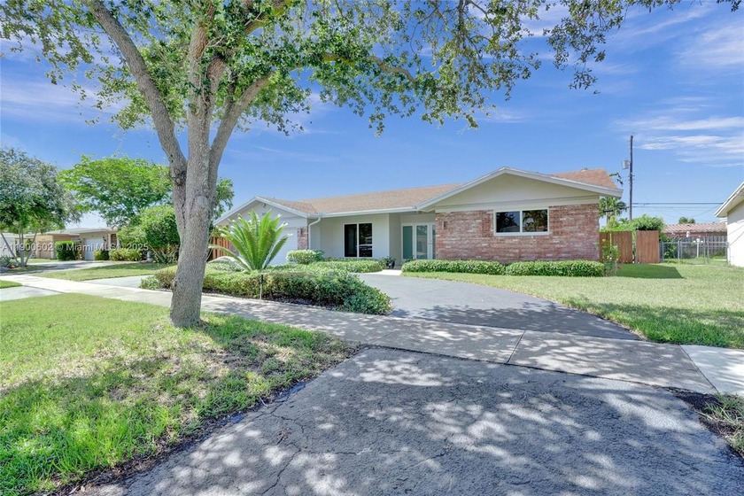Welcome to this stunning 4-bed/den home located in highly sought - Beach Home for sale in Fort Lauderdale, Florida on Beachhouse.com