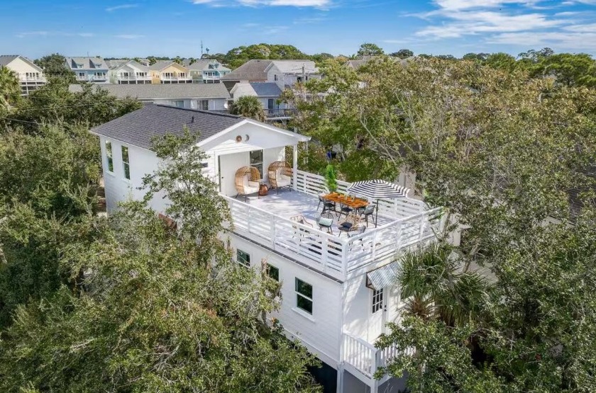 Welcome to 79 Sandbar Lane - a stunning coastal retreat nestled - Beach Home for sale in Folly Beach, South Carolina on Beachhouse.com