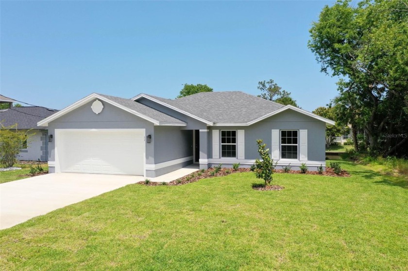 BRAND NEW SALTWATER CANAL HOME Located in the Premier *C* - Beach Home for sale in Palm Coast, Florida on Beachhouse.com
