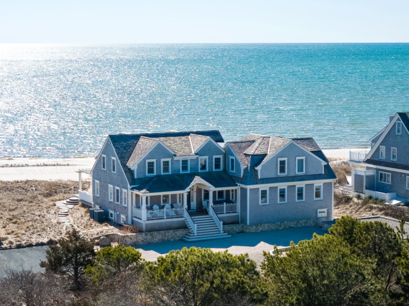 Experience the epitome of beachfront living in this stunning - Beach Home for sale in Harwich Port, Massachusetts on Beachhouse.com