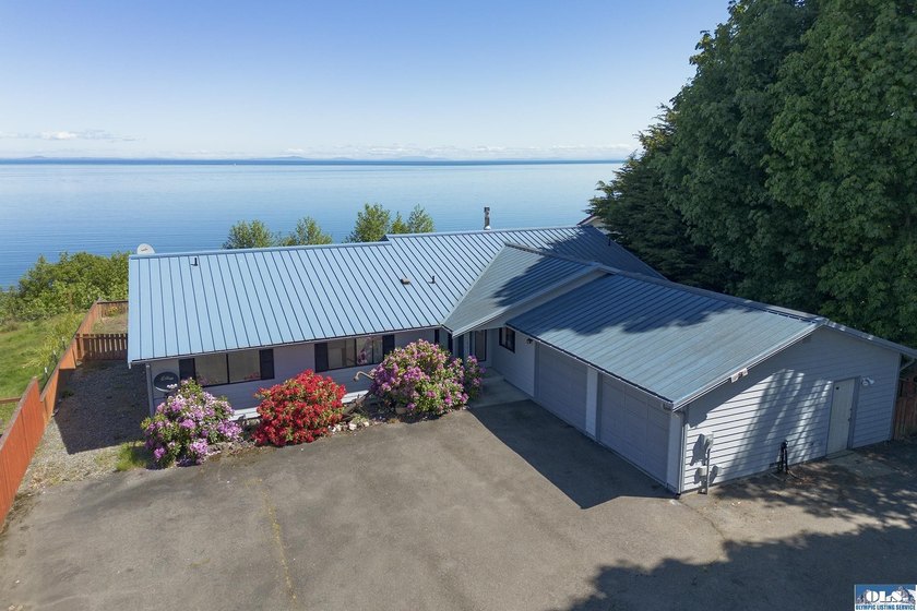 Perched on a high-bank overlooking the waterfront, this property - Beach Home for sale in Port Angeles, Washington on Beachhouse.com