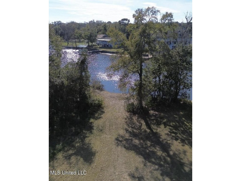 Nestled in the private Riverwalk Subdivision, this lot offers an - Beach Lot for sale in Biloxi, Mississippi on Beachhouse.com