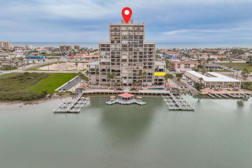 Perched on the Laguna Madre bay, this unique 3/2 is a blend of - Beach Condo for sale in South Padre Island, Texas on Beachhouse.com