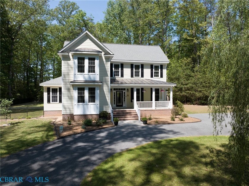 Nestled in the sought-after River Watch subdivision, this - Beach Home for sale in Gloucester, Virginia on Beachhouse.com