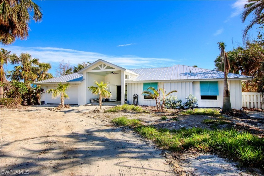 This home is located in the near beach community of Chateaux Sur - Beach Home for sale in Sanibel, Florida on Beachhouse.com
