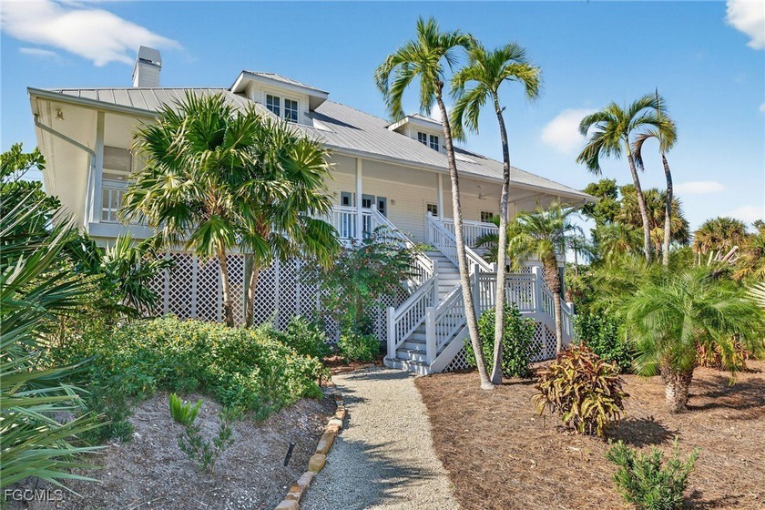 Perfectly combining Island Beach House with Southern Charm, this - Beach Home for sale in Sanibel, Florida on Beachhouse.com