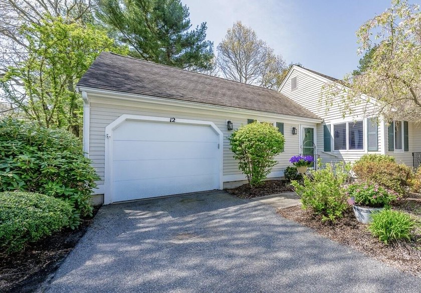 Experience the ease of one-level living in this desirable end - Beach Condo for sale in Mashpee, Massachusetts on Beachhouse.com