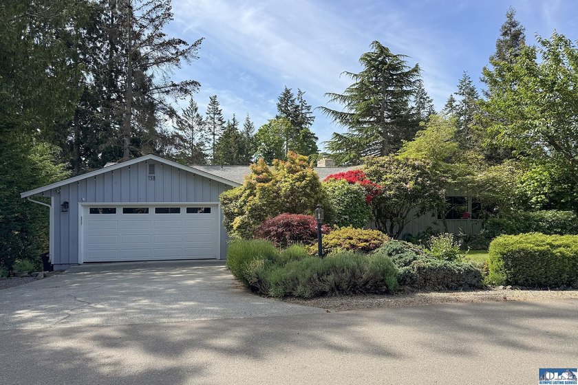 Tucked along the golf course-rather than surrounded by dense - Beach Home for sale in Sequim, Washington on Beachhouse.com