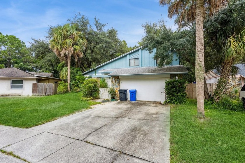 Welcome to 16133 Ravendale Dr., boasting over 2100 sq ft of - Beach Home for sale in Tampa, Florida on Beachhouse.com