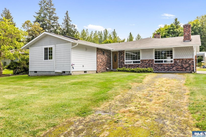Welcome home to this spacious 3-bedroom, 2-bath property - Beach Home for sale in Port Angeles, Washington on Beachhouse.com