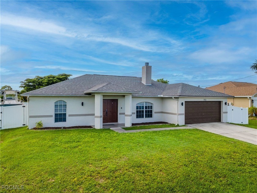 Welcome to 1910 NW 14th Ter, a beautiful pool home tucked away - Beach Home for sale in Cape Coral, Florida on Beachhouse.com