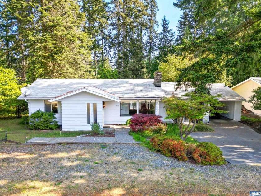 Cute home in one of Sequim's best neighborhoods. Nestled amongst - Beach Home for sale in Sequim, Washington on Beachhouse.com