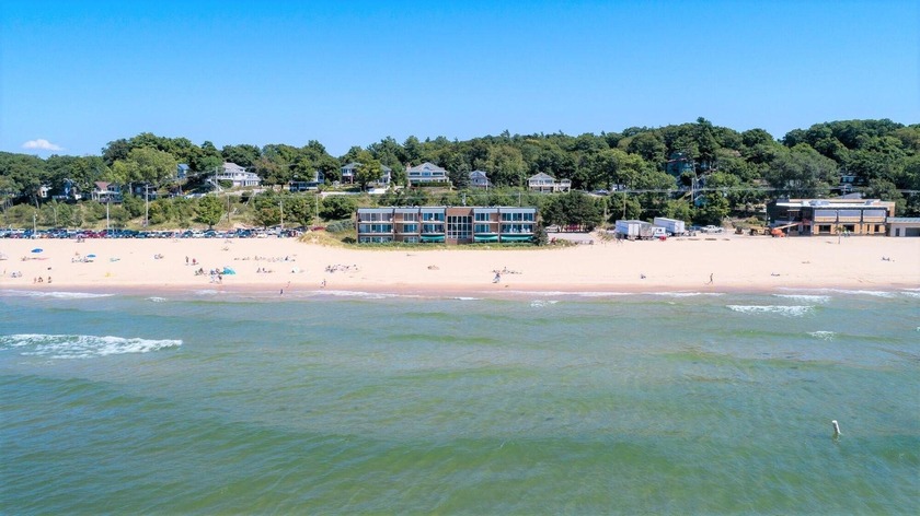 This turn-key Lake Michigan condo delivers a front-row shoreline - Beach Condo for sale in Grand Haven, Michigan on Beachhouse.com