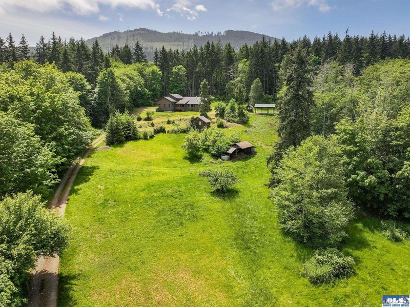 Tucked at the end of a gated drive on Mt. Pleasant, this - Beach Home for sale in Port Angeles, Washington on Beachhouse.com