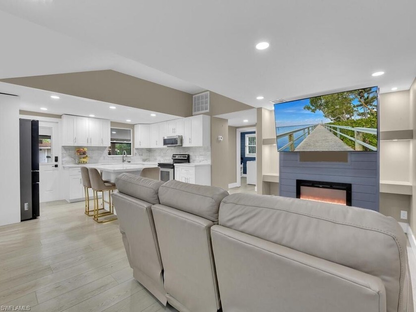 Beautifully updated open-concept home featuring a bright and - Beach Home for sale in Naples, Florida on Beachhouse.com