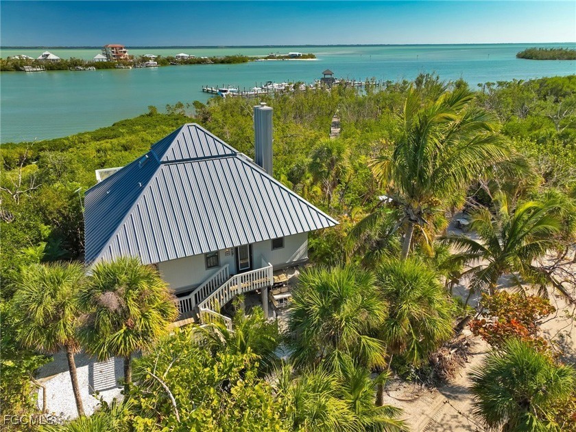 The perfect boater's retreat! This charming three-bedroom - Beach Home for sale in North Captiva Island, Florida on Beachhouse.com