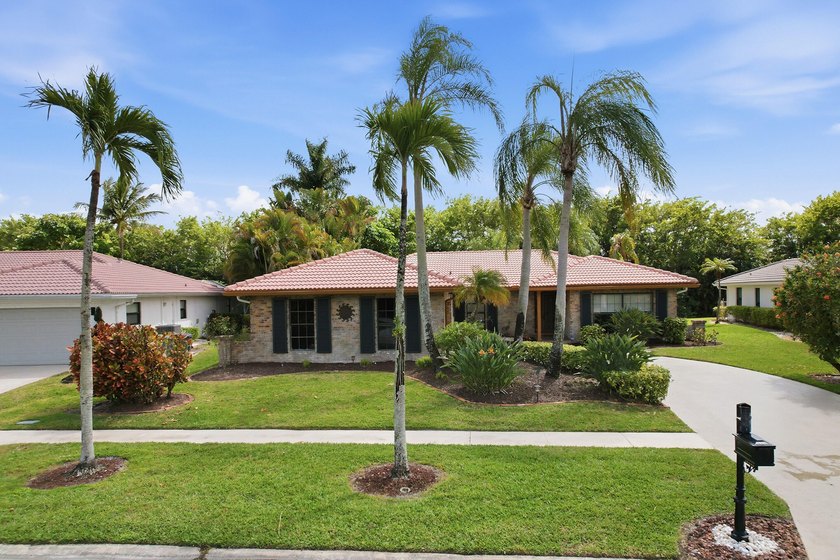 Enjoy true indoor/outdoor living in this beautifully maintained - Beach Home for sale in Boca Raton, Florida on Beachhouse.com