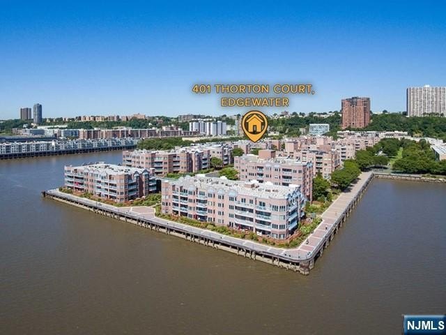 Welcome to Independence Harbor! This bright and spacious - Beach Home for sale in Edgewater, New Jersey on Beachhouse.com