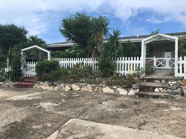 Lovely 2 bedroom/2 bath townhouse located in between a triplex - Beach Townhome/Townhouse for sale in Providenciales, West Caicos, Turks & Caicos Islands on Beachhouse.com
