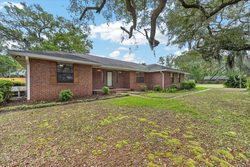 Situated on a beautiful corner lot in the desirable Poquito - Beach Home for sale in Shalimar, Florida on Beachhouse.com