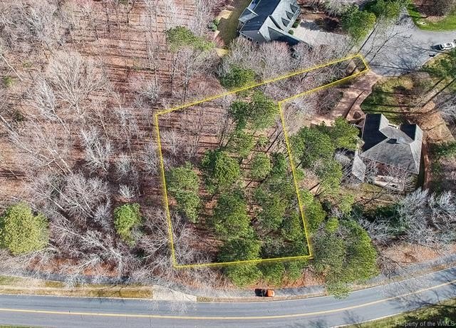 This serene wooded lot in Ford's Colony features a gentle slope - Beach Lot for sale in Williamsburg, Virginia on Beachhouse.com