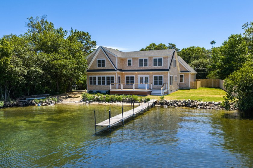 Experience the pinnacle of lakefront living with this stunning - Beach Home for sale in Centerville, Massachusetts on Beachhouse.com
