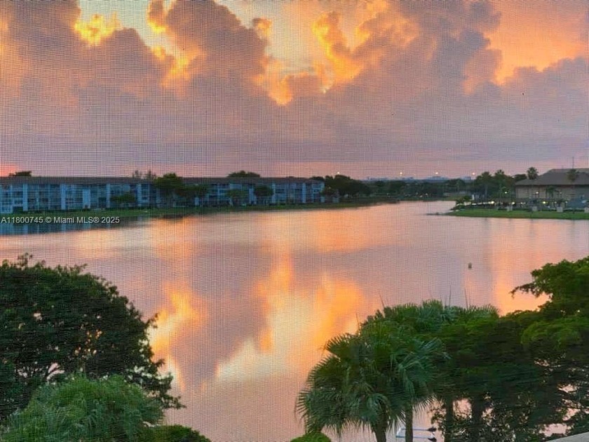 Enjoy stunning LAKE VIEWS from your 4TH FLOOR balcony! This - Beach Condo for sale in Pembroke Pines, Florida on Beachhouse.com