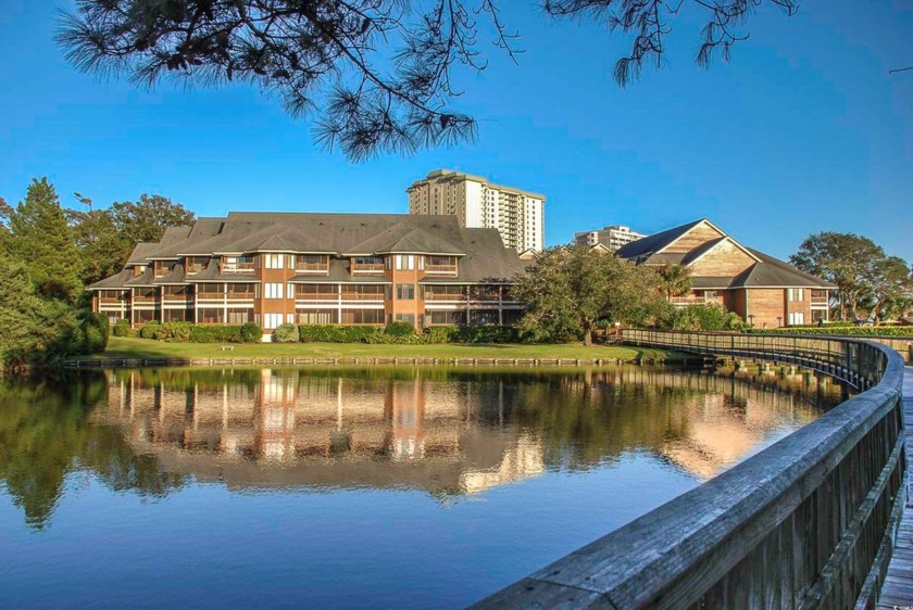 Beautiful lake view from this large screened-in porch that has - Beach Condo for sale in Myrtle Beach, South Carolina on Beachhouse.com