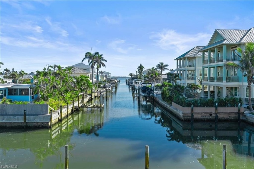 STUNNING Corner Waterfront Condo with Bay and Gulf Views, Boat - Beach Condo for sale in Fort Myers Beach, Florida on Beachhouse.com